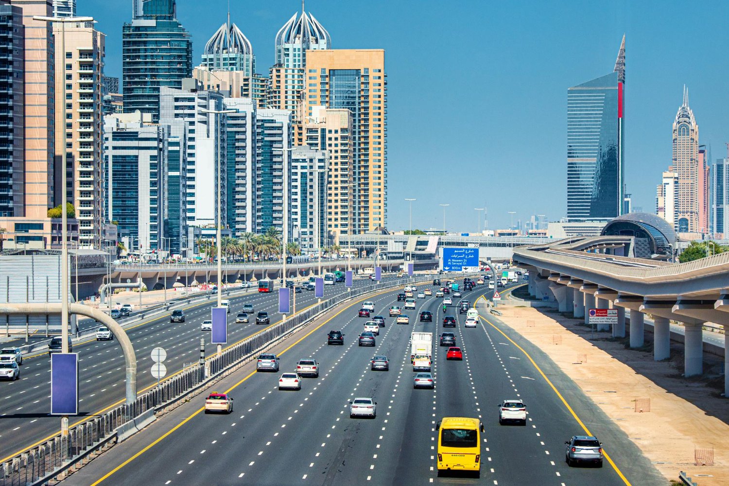 Dubai traffic on Sheikh Zayed Road with city skyline, used for a guide on checking and paying Dubai traffic fines